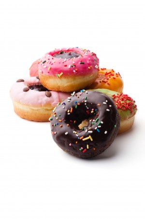 Group of glazed donuts, isolated on white background