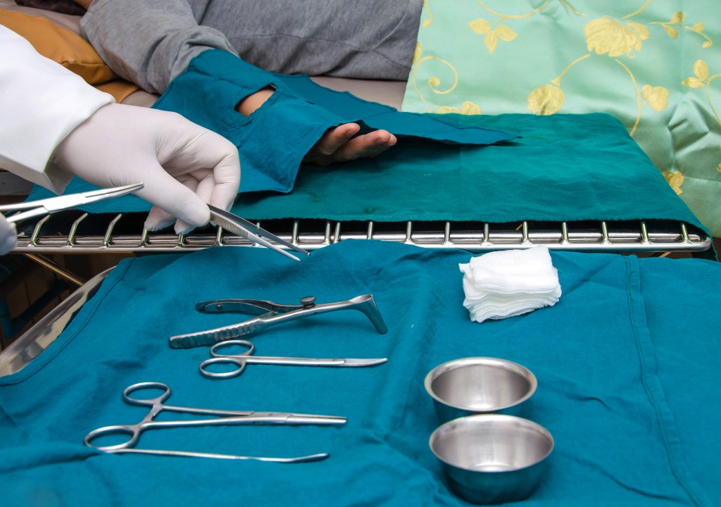 Surgeon and Surgical instruments in operation.