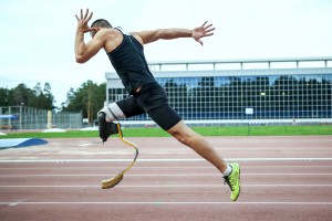 Explosive start of athlete with handicap at the stadium