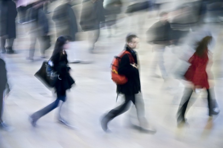 Crowd of people rushing on the street in motion blur_dreamstime_8371424